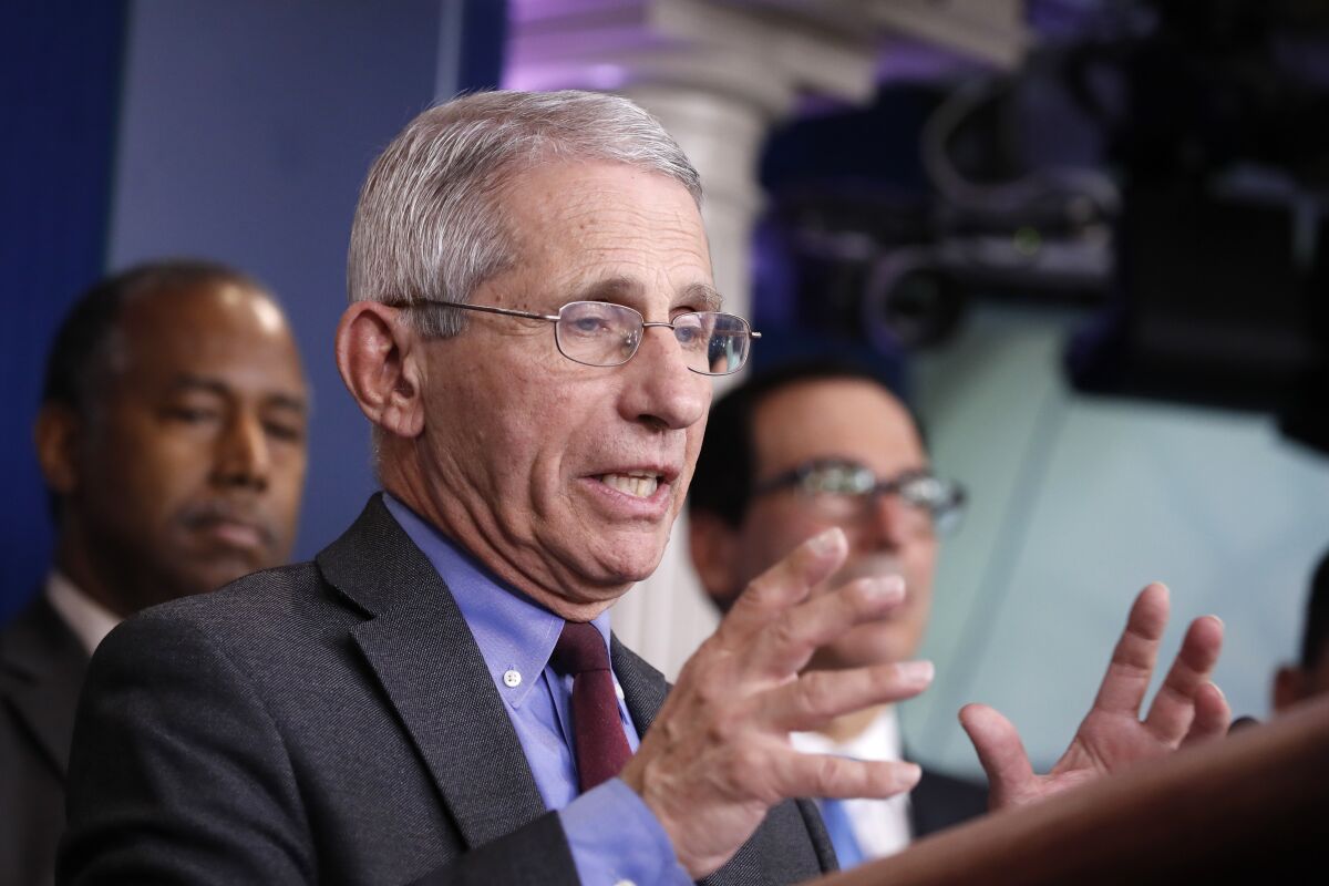 Dr. Anthony Fauci, director of the National Institute of Allergy and Infectious Diseases, speaks during a briefing on coronavirus on Saturday at the White House in Washington.