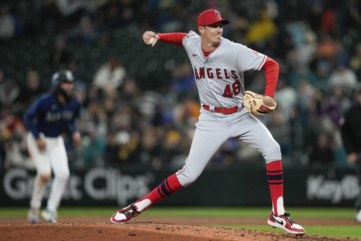 Angels relief pitcher Jimmy Herget throws against the Seattle Mariners during a game in Seattle.