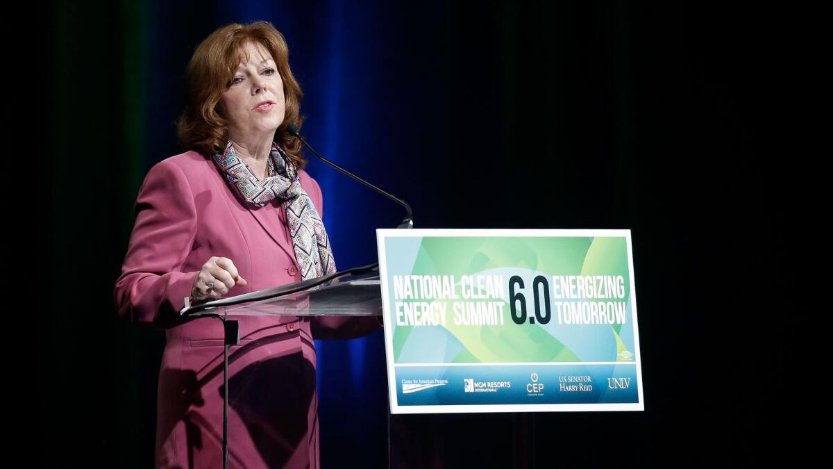 Sempra Energy CEO Debra Reed speaks during the National Clean Energy Summit 6.0 in Las Vegas in 2013. Reed said Monday she is stepping down.