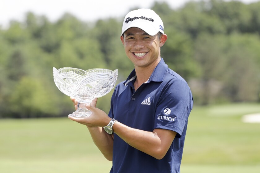 Collin Morikawa holds his Workday Charity Open trophy Sunday in Dublin, Ohio.
