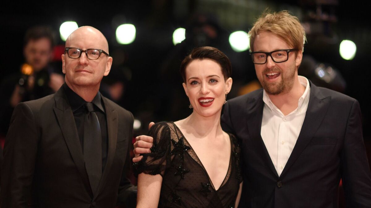 Director Steven Soderbergh, left, actress Claire Foy and actor Joshua Leonard arrive for the premiere of "Unsane" during the 68th annual Berlin International Film Festival (Berlinale), in Berlin in February 2018.