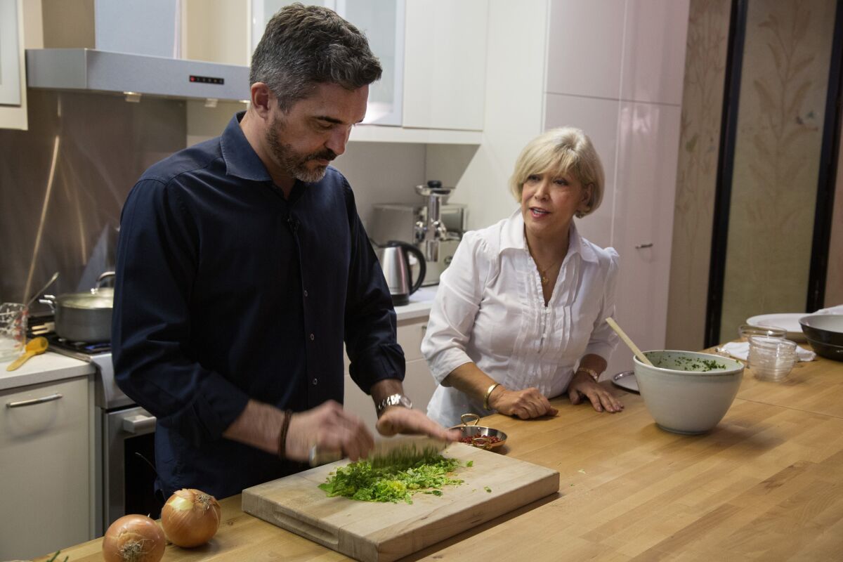 Chef Tony Esnault, of Spring, Ct, and his mother-in-law Shamsi Katebi cooking for Nowruz, the Persian New Year.