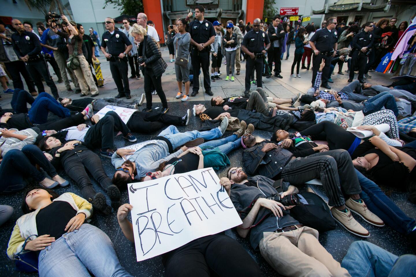 Demonstrators protesting police brutality lie on the sidewalk for a "die-in" outside the TCL Chinese Theatre in Hollywood.