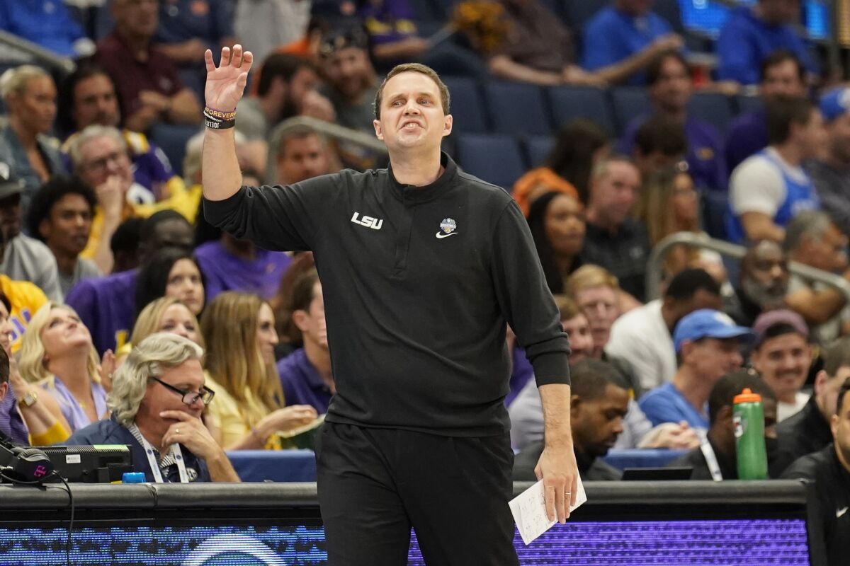 LSU head coach Will Wade directs his team against Missouri during the first half of an NCAA men's college basketball game at the Southeastern Conference tournament in Tampa, Fla., Thursday, March 10, 2022. (AP Photo/Chris O'Meara)