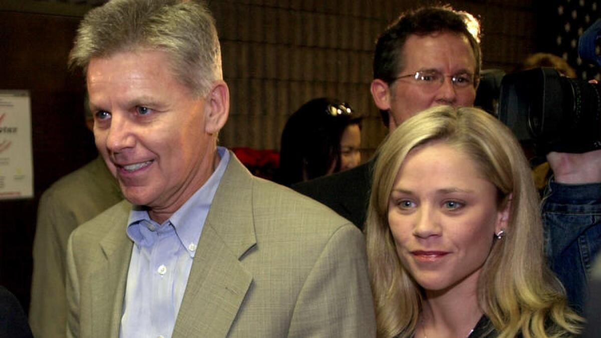 Then-Rep. Gary Condit, left, and his daughter, Cadee, in 2002.