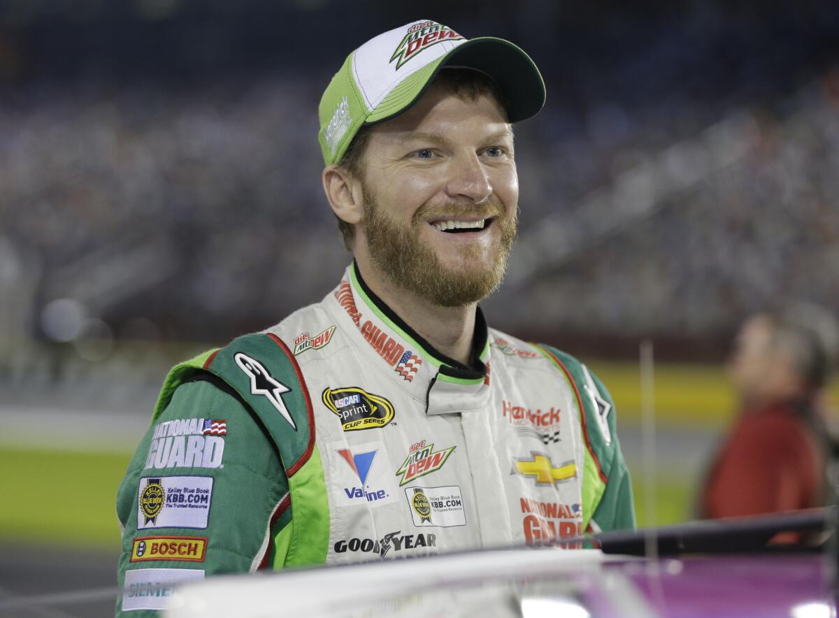 Dale Earnhardt Jr. smiles Oct. 9 before qualifying for Saturday's NASCAR Bank of America Sprint Cup series race at Charlotte Motor Speedway in Concord, N.C.