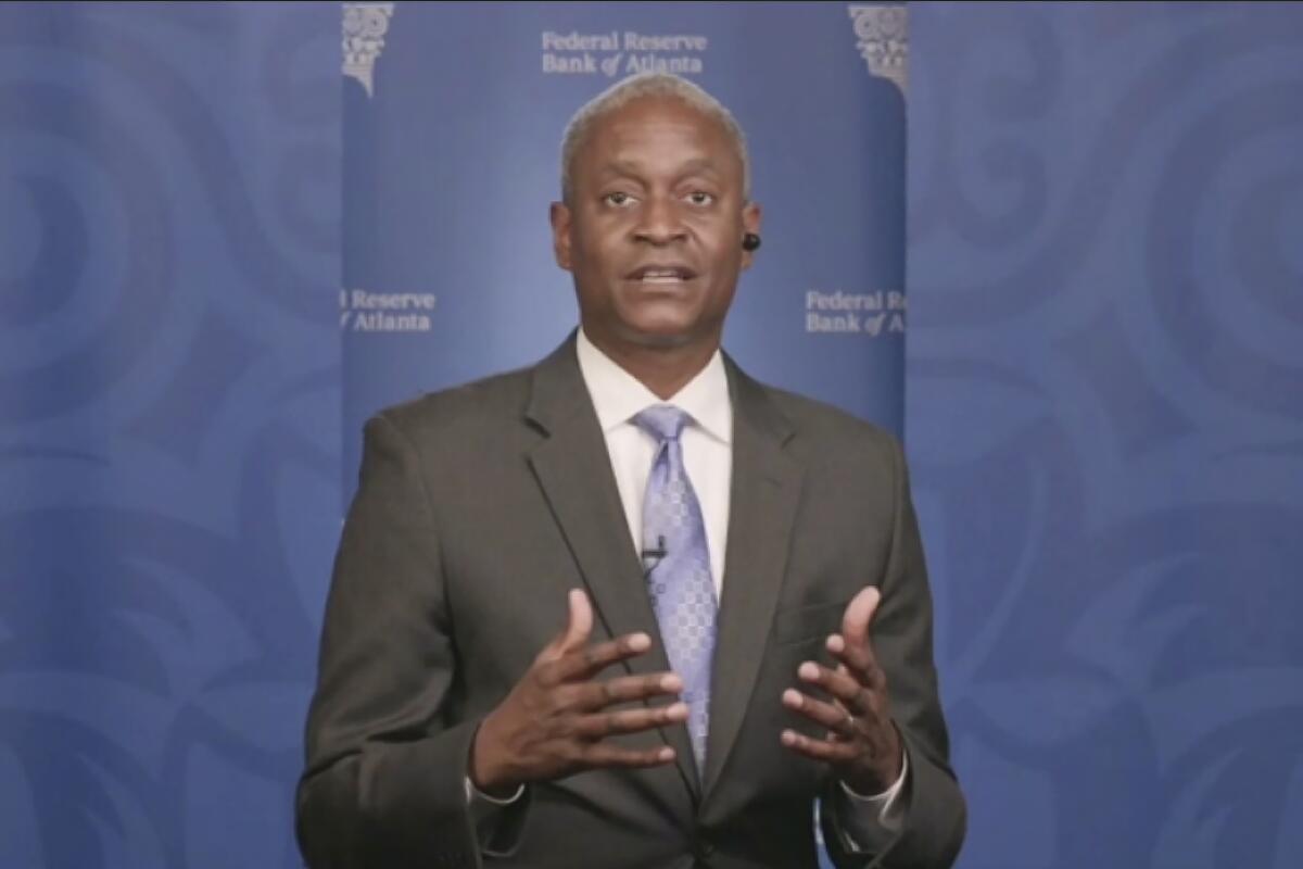FILE - In this still image from video, Atlanta Federal Reserve Bank President Raphael Bostic speaks from Atlanta during a webinar sponsored by the 12 regional Fed banks to address the lack of racial disparity in the field of economics on Tuesday, April 13, 2021. Bostic said Friday, Oct. 14, 2022, that many of his financial trades and investments in the past five years inadvertently violated the central bank's ethics rules, and he has revised all his financial disclosures since becoming president in 2017.(AP Photo, File)