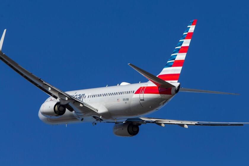 Mandatory Credit: Photo by ERIK S LESSER/EPA-EFE/REX (10152274h) An American Airlines Boeing 737-800 (Tail number N964NN) departs from Ronald Reagan-National Airport in Arlington, Virginia, USA, 12 March 2019. The Boeing 737 Max 8 aircraft has come under scrutiny after similar deadly crashes in Ethiopia and Indonesia. Several countries and airlines have grounded 737 Max 8 planes. Boeing 737 aircraft at Ronald Reagan-National Airport in Arlington, Virginia, USA - 12 Mar 2019 ** Usable by LA, CT and MoD ONLY **