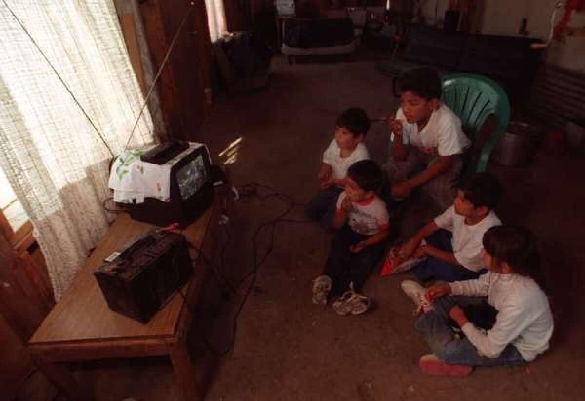 Researchers say parents' TV habits are associated with how much kids watch.