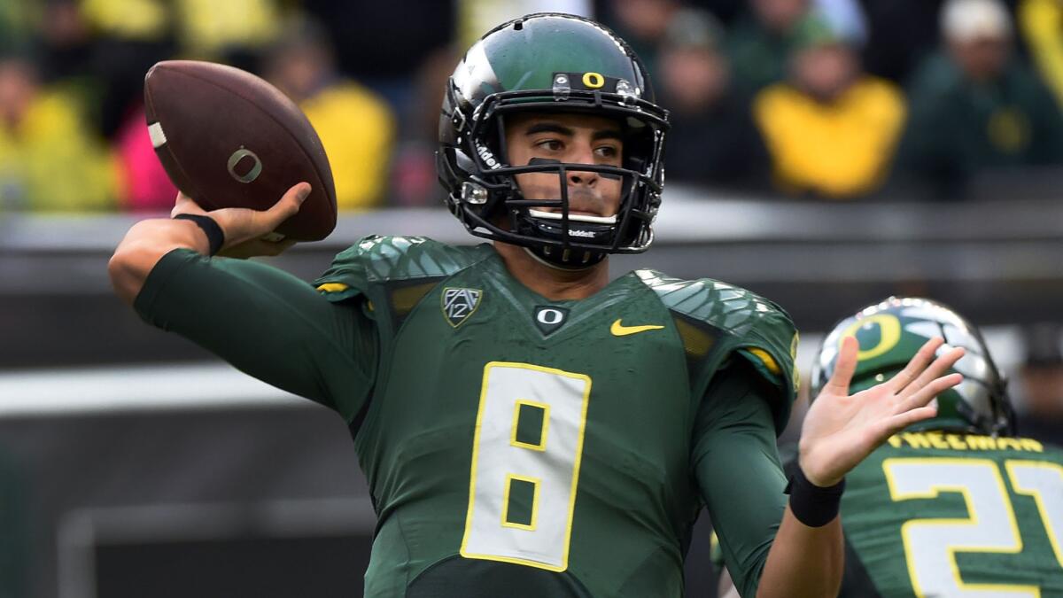 Oregon quarterback Marcus Mariota passes during a win over Colorado on Nov. 22. Oregon will play Florida State in the Rose Bowl on New Year's Day.