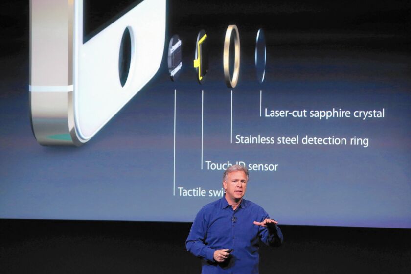 Scanning software and passcode-guessing gadgets can get some data from newer iPhones that are locked and running iOS 8 or iOS 9. Above, Apple’s Phil Schiller, senior vice president of worldwide marketing, speaks about iPhone security features at a product announcement in 2013.