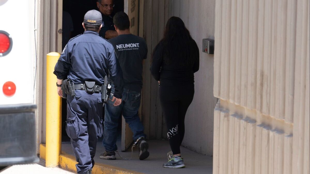 Migrants in U.S. Customs and Border Protection custody in El Paso.