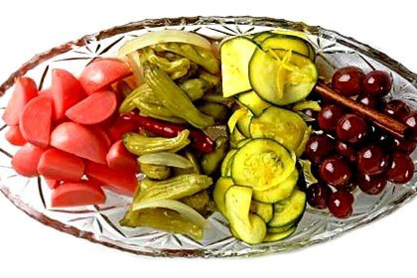 SPICY BITES: The relish tray includes pickled radishes, peppers, zucchini and grapes.