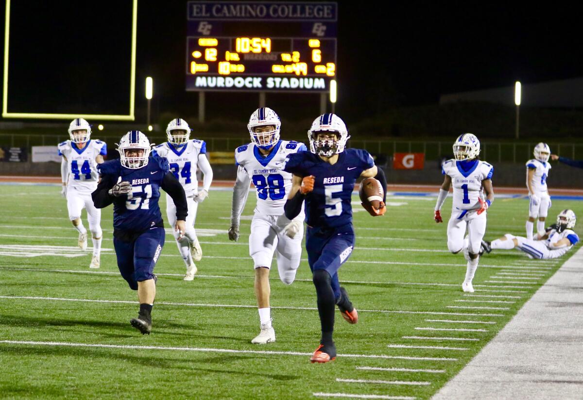 Reseda wide receiver Dranel Rhodes sprints down the sideline on his way to scoring a 51-yard touchdown in a 2019 game.