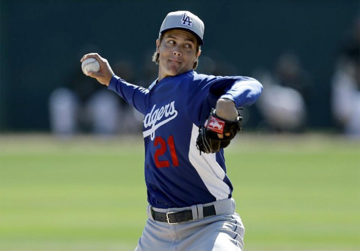 Dodgers' Zack Greinke pitches against the Chicago White Sox earlier this spring.