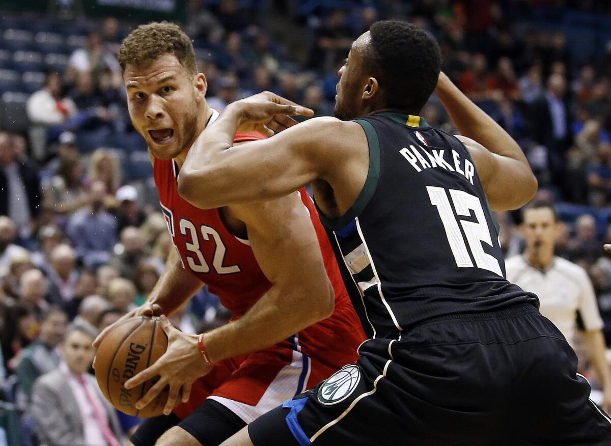 Los Angeles Clippers' Blake Griffin tries to drive past Milwaukee Bucks' Jabari Parker during the first half last Wednesday.