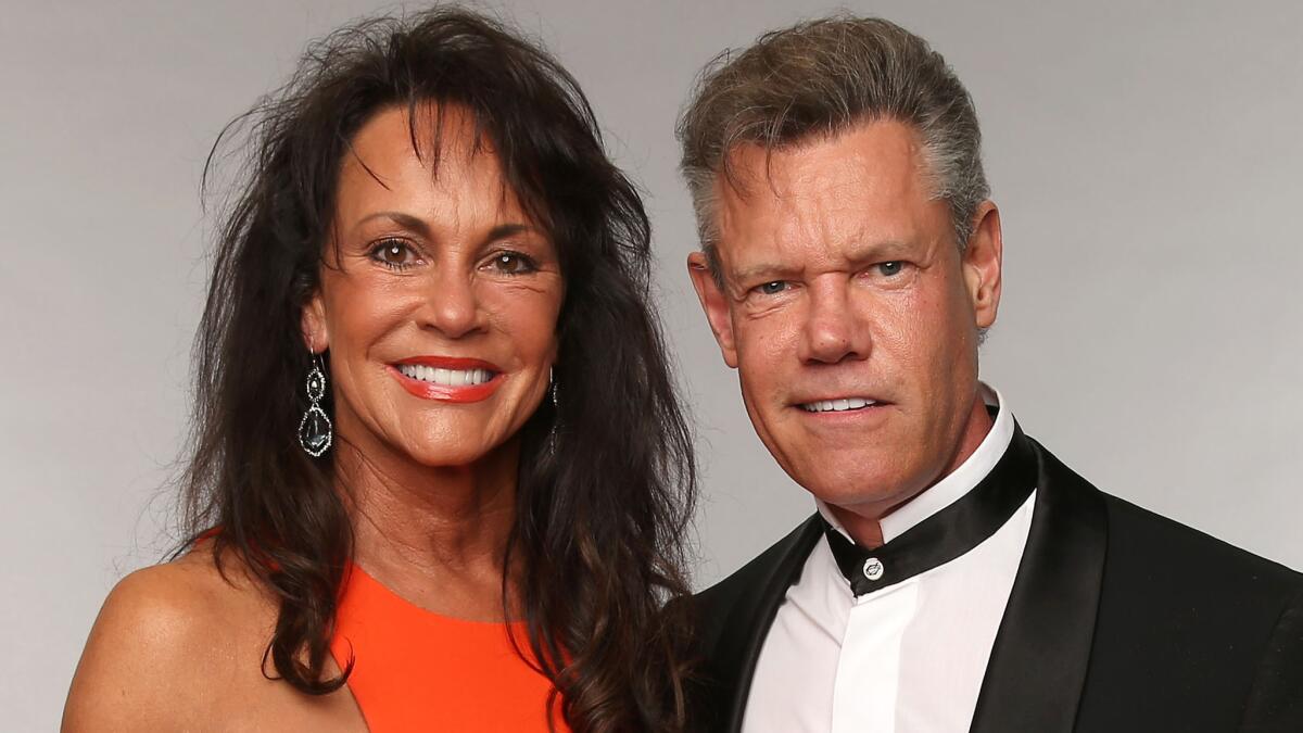 Mary Davis and Randy Travis at the CMT Music Awards in June 2013, a month before he suffered a debilitating stroke.