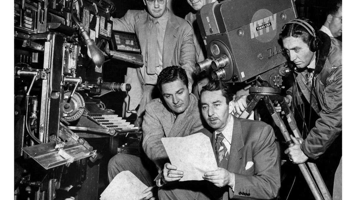 Jan. 18, 1951: A film crew from KTTV-TV lines up a shot of a Linotype machine in the Los Angeles Times composing room. 