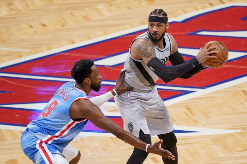 Brooklyn Nets forward Jeff Green (8) guards against Portland Trail Blazers forward Carmelo Anthony (00) during the second half of an NBA basketball game, Friday, April 30, 2021, in New York. (AP Photo/Mary Altaffer)