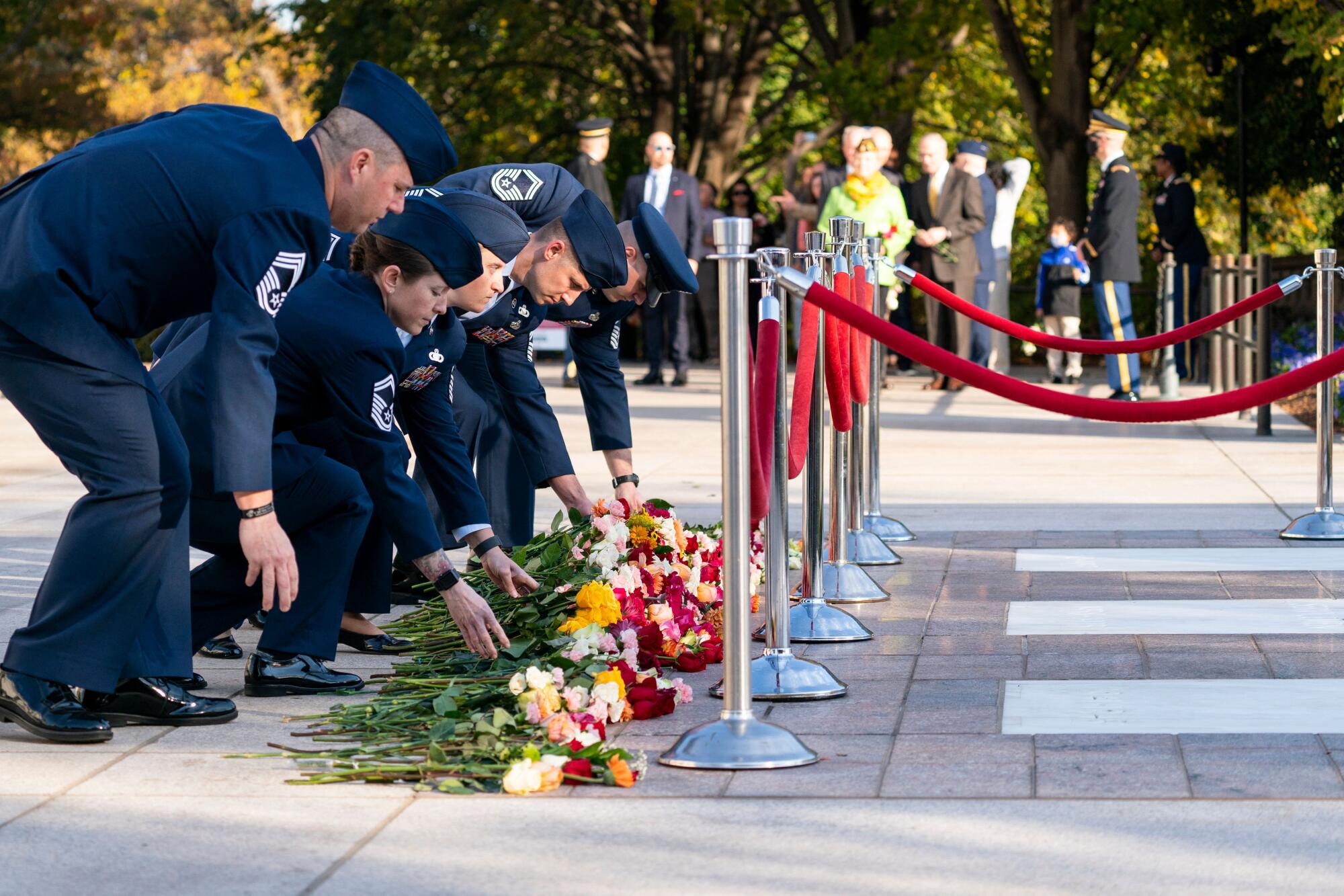 U.S. Air Force airmen place flowers at the Tomb of the Unknowns