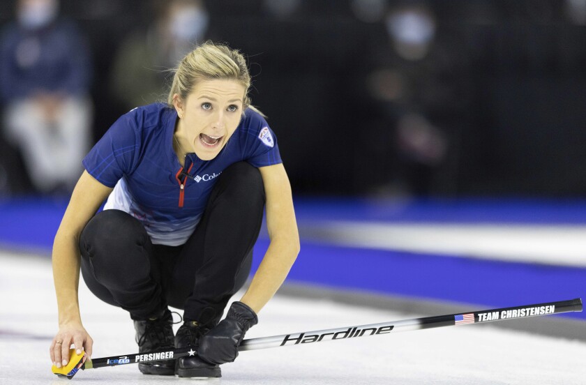 Team Christensen's Vicky Persinger yells to teammates after throwing the rock while competing against Team Peterson during the second night of finals at the U.S. Olympic Curling Team Trials at Baxter Arena in Omaha, Neb., Saturday, Nov. 20, 2021. (AP Photo/Rebecca S. Gratz)