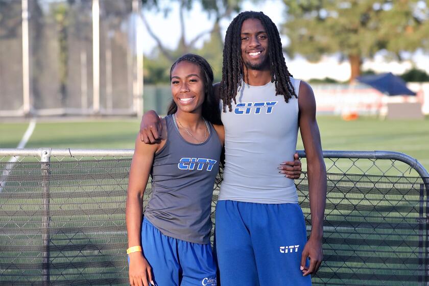 Culver City's Morgan Maddox, left, and Duaine Mayrant pose for a photo.