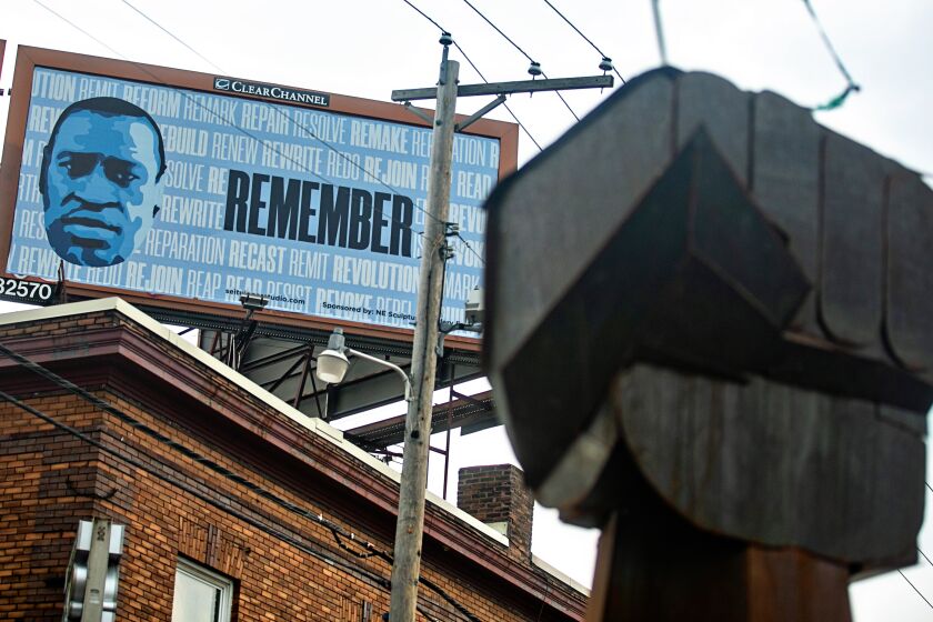 MINNEAPOLIS, MN - APRIL 08: A billboard that overlooks George Floyd Square on Thursday, April 8, 2021 in Minneapolis, MN. (Jason Armond / Los Angeles Times)