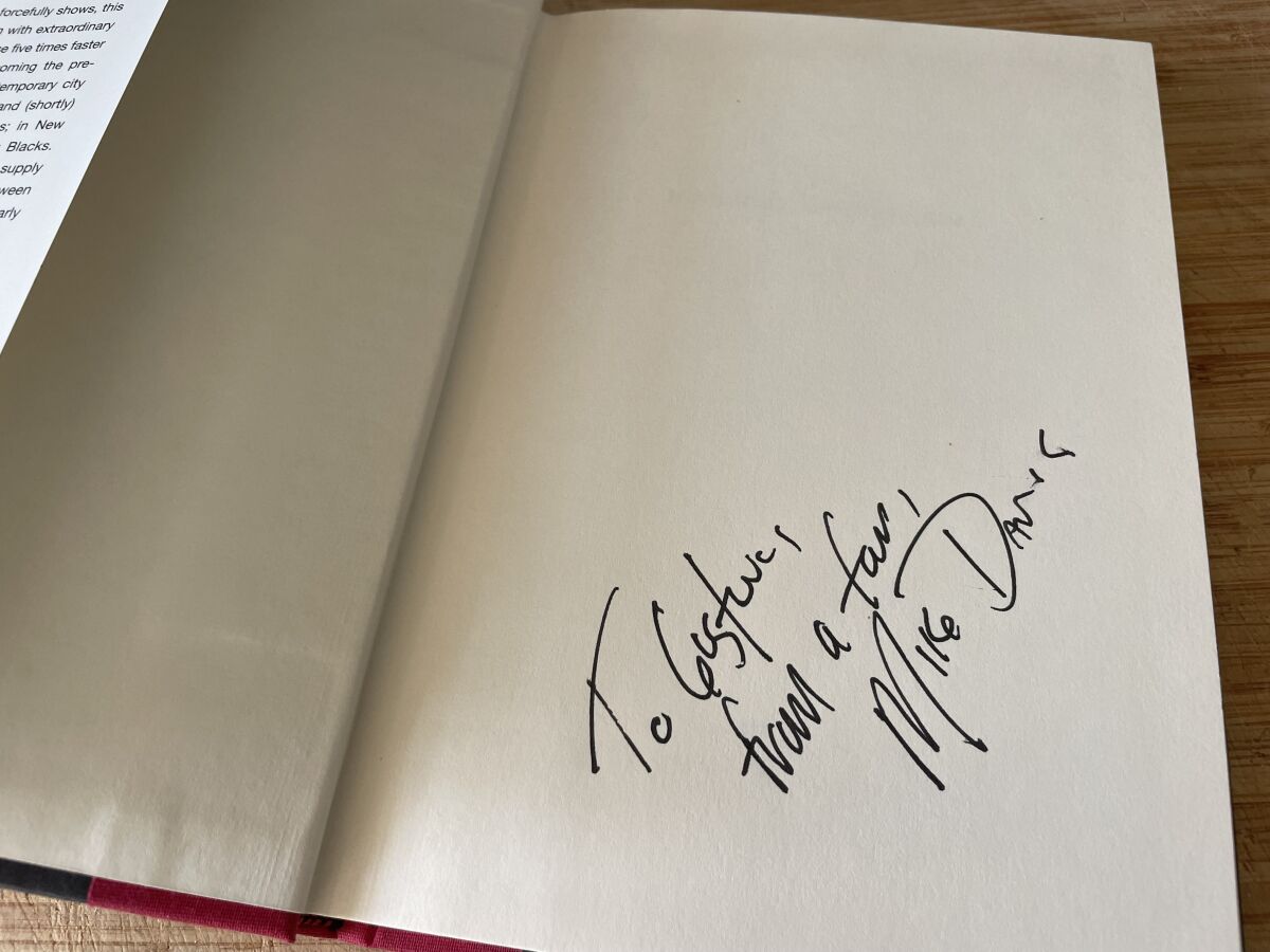 A copy of "Magical Urbanism" that Mike Davis signed for the author in 2003.