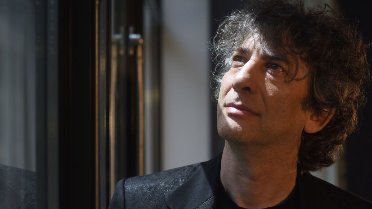 Neil Gaiman, who created the comedic limited series "Good Omens," about the bungling of Armageddon, is seen at the Whitby Hotel in Manhattan, N.Y.