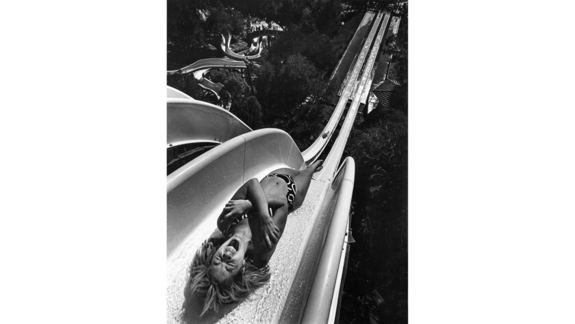 July 19, 1987: A park patron screams as she begins the 80-foot drop down the park's most fearful ride at Raging Waters.