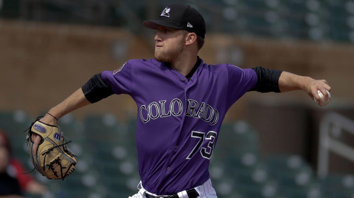 Colorado Rockies rookie Kyle Freeland pitches against the Dodgers in a spring training game. He'll make his major league debut against the Dodgers on Friday.