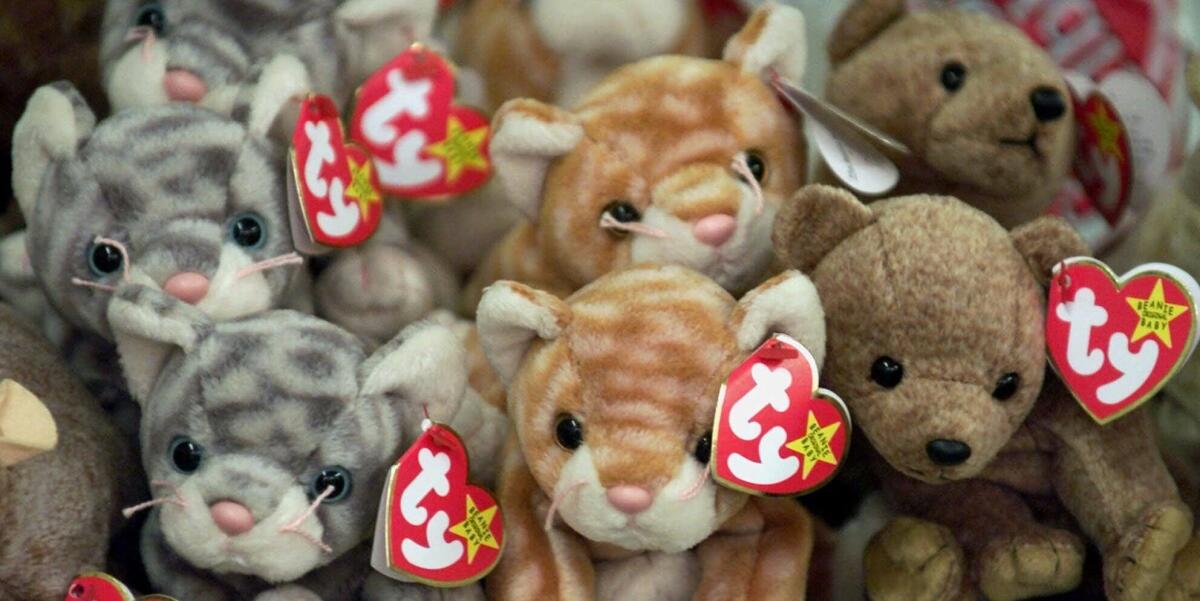 Beanie Babies rest on a shelf at a specialty store in Chicago. The creator of the popular stuffed toys, Ty Warner, has agreed to pay a $53.5-million tax penalty, federal officials said.