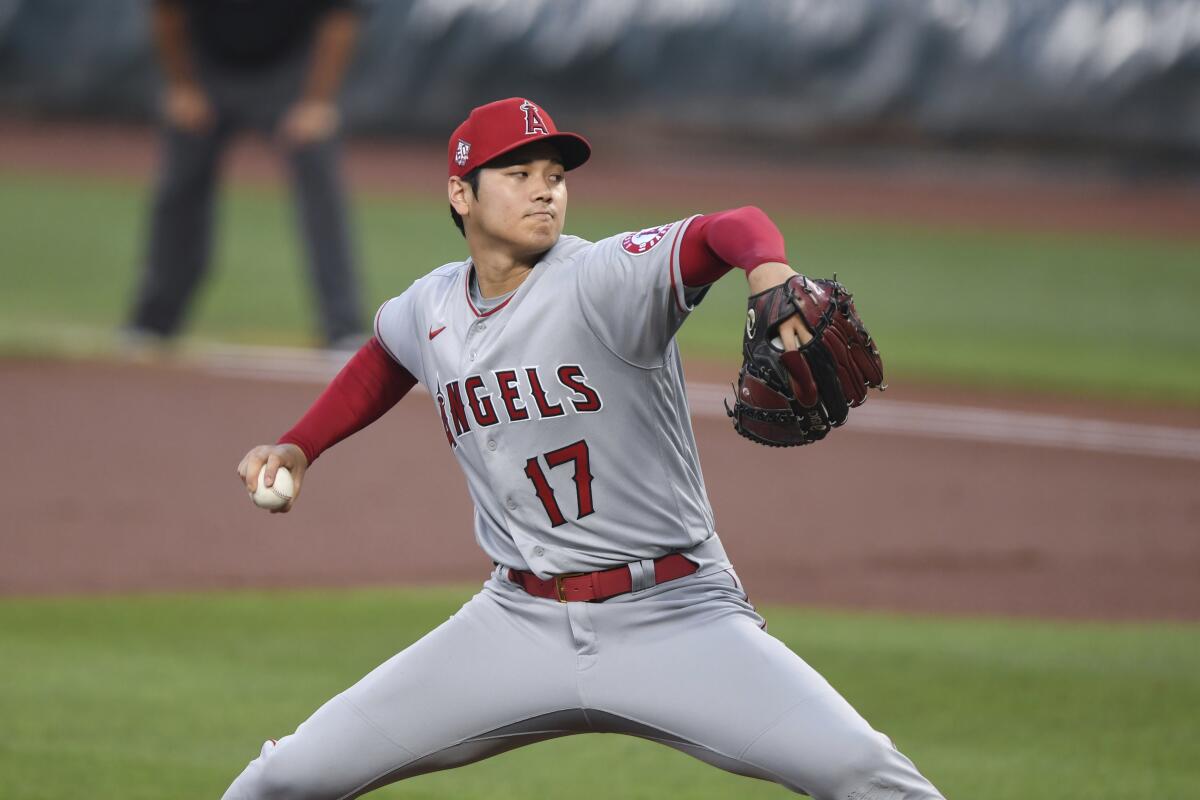 Angels pitcher Shohei Ohtani winds up during the first inning against the Baltimore Orioles.