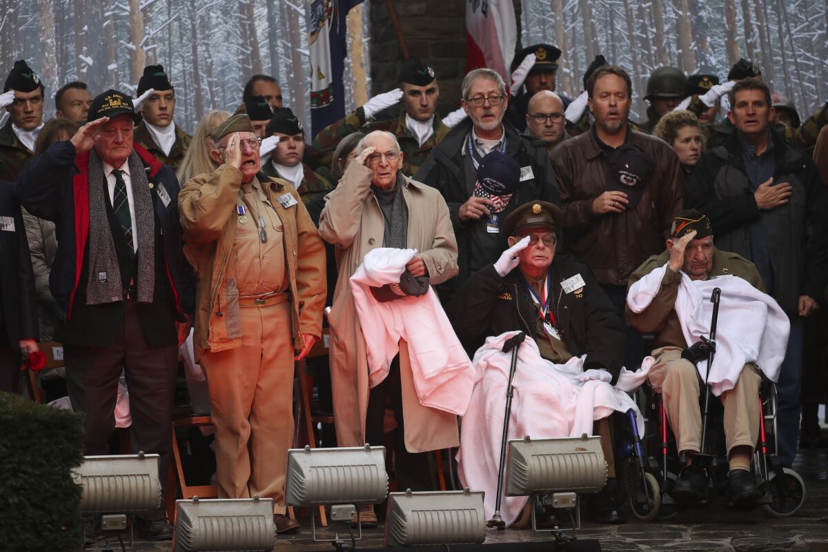 Veterans attend a ceremony to commemorate the anniversary of the Battle of the Bulge in Belgium on Monday.