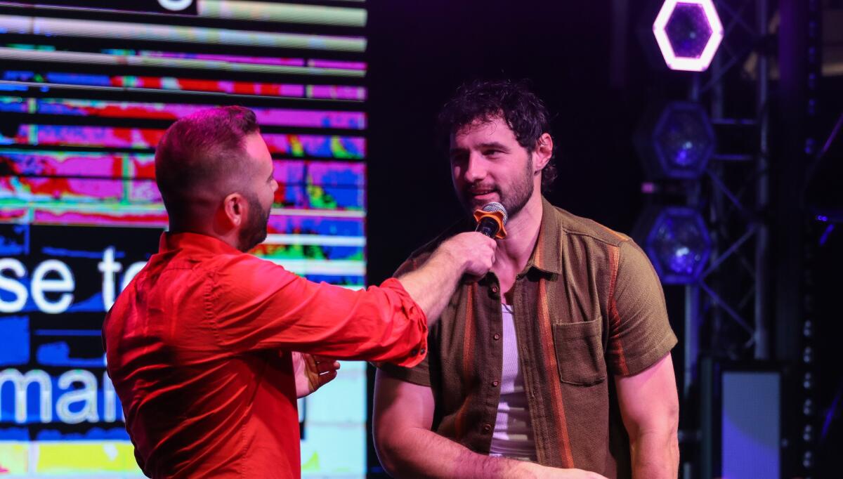 Stier and Merrifield on stage at "Queer Roast for the Straight Hosts."
