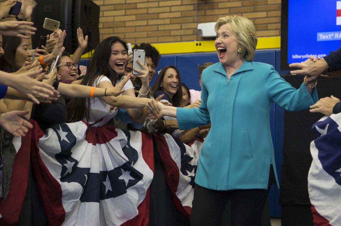 Democratic presidential candidate Hillary Clinton greets supporters before a campaign address at UC Riverside.