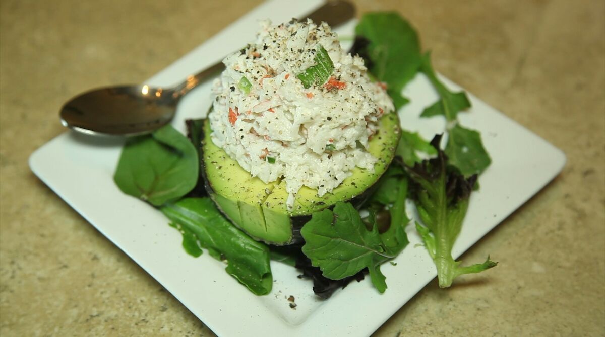 Fresh avocado, halved and stuffed with krab salad at California Avocado Grill in Escondido. — David Brooks