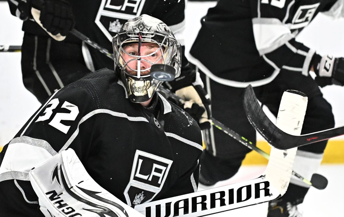 Los Angeles, California May 8, 2022-Kings goalie Jonathan Quick makes a save against the Oilers.