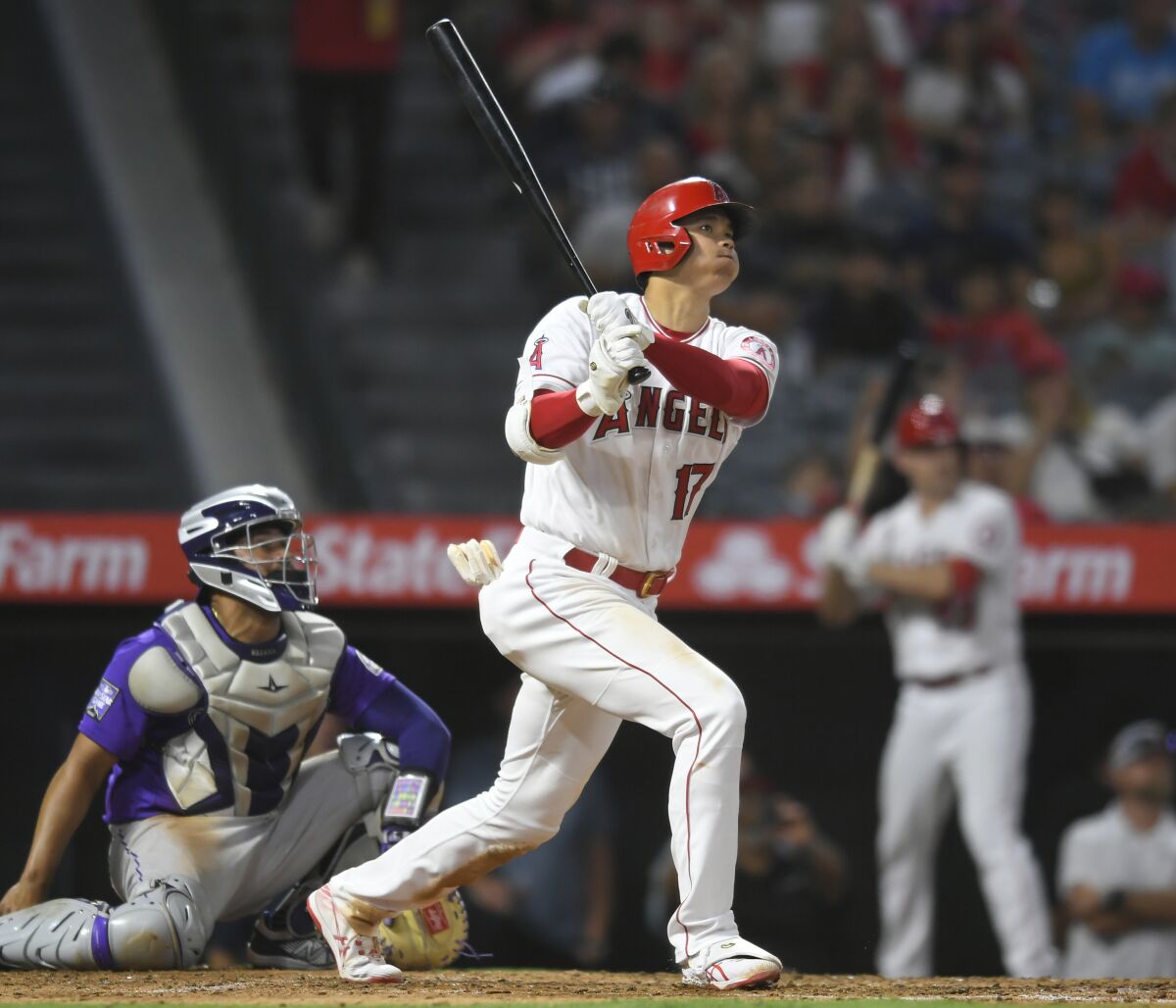 Angels' Shohei Ohtani watches his three-run home run.