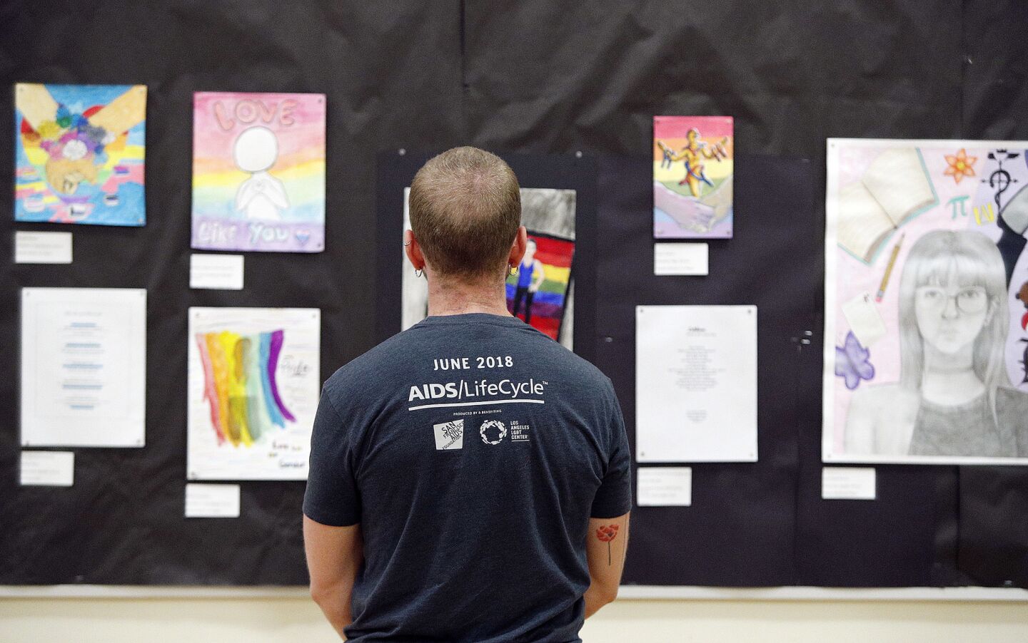 Ben Evans, Programs and Gallery Director for ACE/121 Gallery Art Gallery in Glendale at the opening night of the PRIDE art show at Crescenta Valley High School on Monday, May 13, 2019. There are 45 art submissions from throughout the Glendale Unified School District, including elementary, middle, and high school pieces. The best of which will be showcased in the city of Glendale's PRIDE 2019 art show at the Ace 121 Art Gallery.