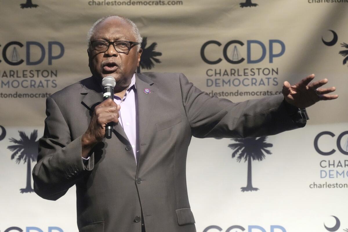 Rep. James Clyburn speaks into a microphone.