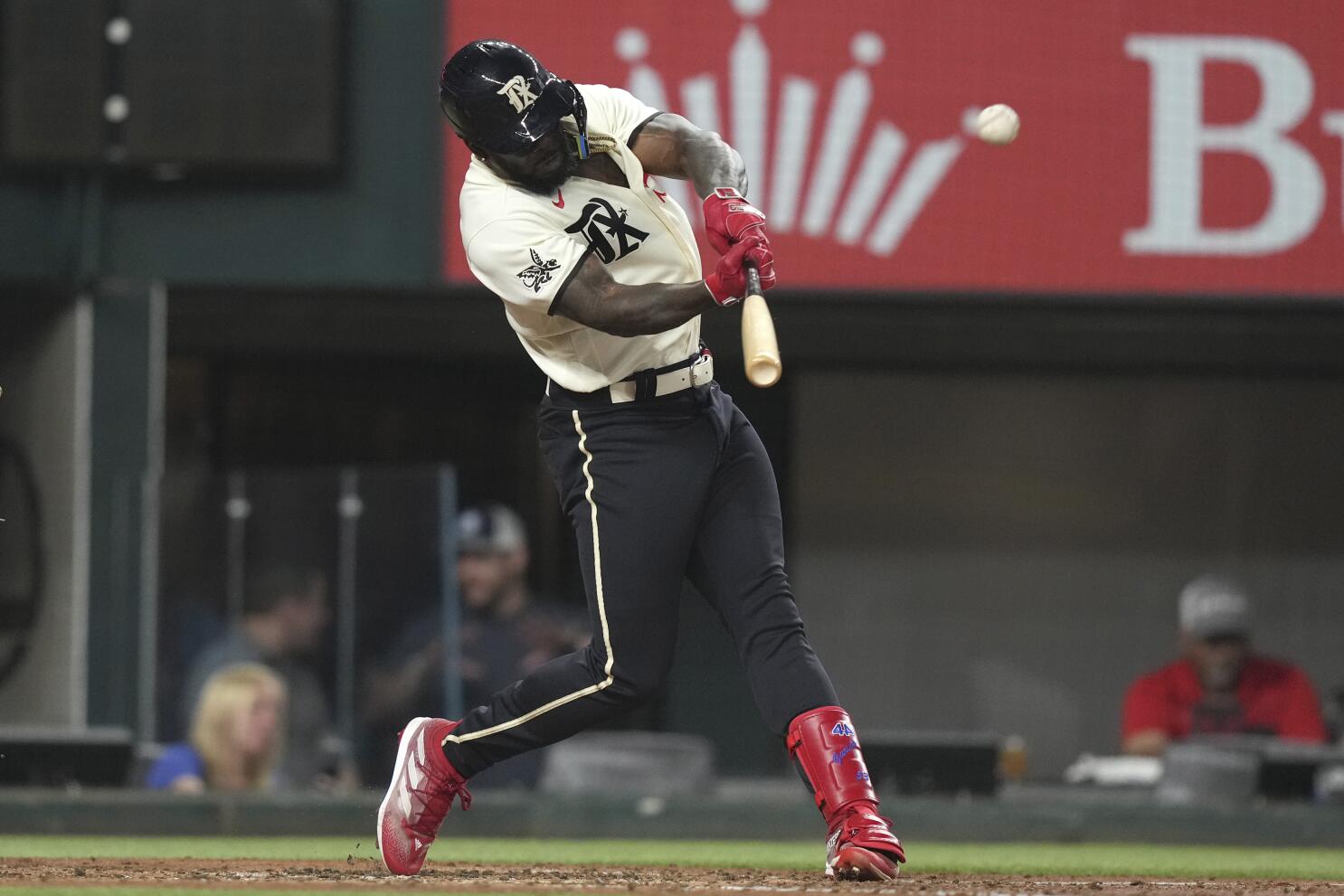 Adolis Garcia goes deep again as Rangers roll past Rockies