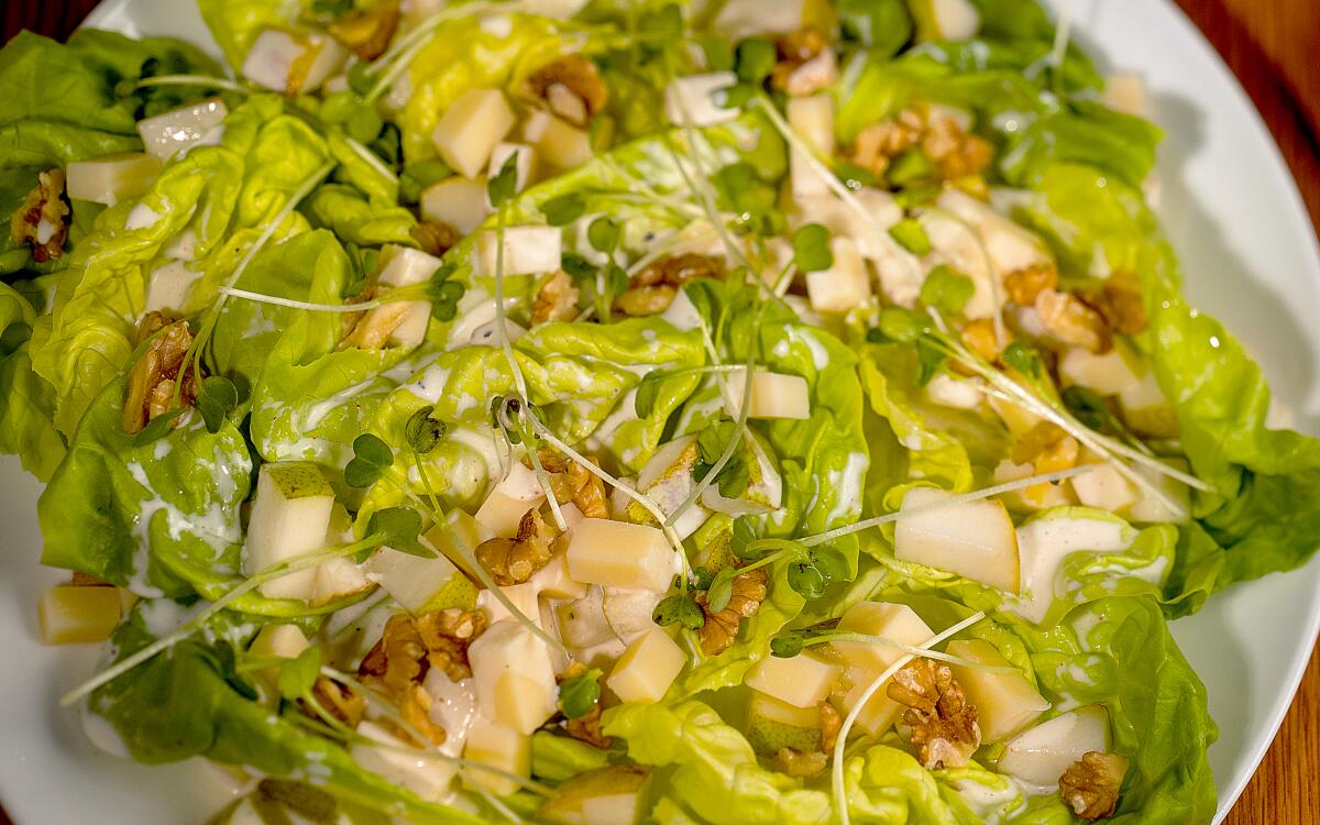Large chunks of sweet pear and musky Gruyere are toppled over butter lettuce and dressed with a tangy buttermilk dressing.