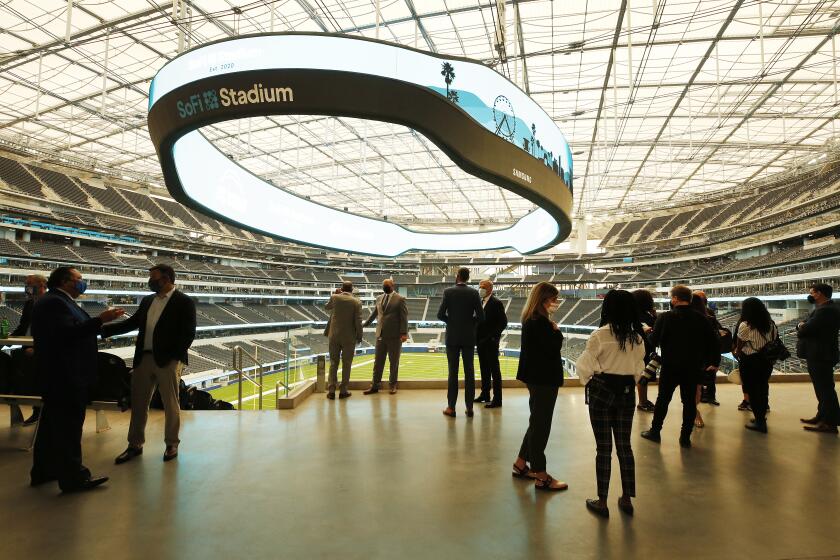 INGLEWOOD, CA - SEPTEMBER 08: Los Angeles Rams and Los Angeles Chargers hosted the official ribbon-cutting ceremony for the new SoFi Stadium on Tuesday September 8, 2020 ahead of the inaugural first game as the Rams as hosts to the Cowboys this Sunday September 13, 2020, followed by the Chargers versus the Chiefs on September 20. The ceremony included Rams Owner/Chairman and SoFi Stadium and Hollywood Park developer E. Stanley Kroenke, Chargers Owner/Chairman Dean Spanos and the City of Inglewood's Mayor James T. Butts. The stadium is the first football stadium to be built within Los Angeles in Nearly 100 years. "We are in the team business, and you can't get to a moment like today without a great team. I would like to thank the 17,000 people who have worked on this project over the past four years," said Rams Owner/Chairman Stan Kroenke. "During a period of unrest and change in many parts of the country, it's been our deepest privilege to work on a project this special with such a diverse workforce. Thank you for making our vision a reality." SoFi Stadium is the first indoor-outdoor stadium and seats approximately 70,000, expandable up to 100,000. SoFi Stadium is located at Hollywood Park, a near 300-acre sports and entertainment destination being developed by Kroenke in Inglewood and at 3.1 million square-foot SoFi Stadium is the largest stadium in the NFL. SoFi Stadium on Tuesday, Sept. 8, 2020 in Inglewood, CA. (Al Seib / Los Angeles Times