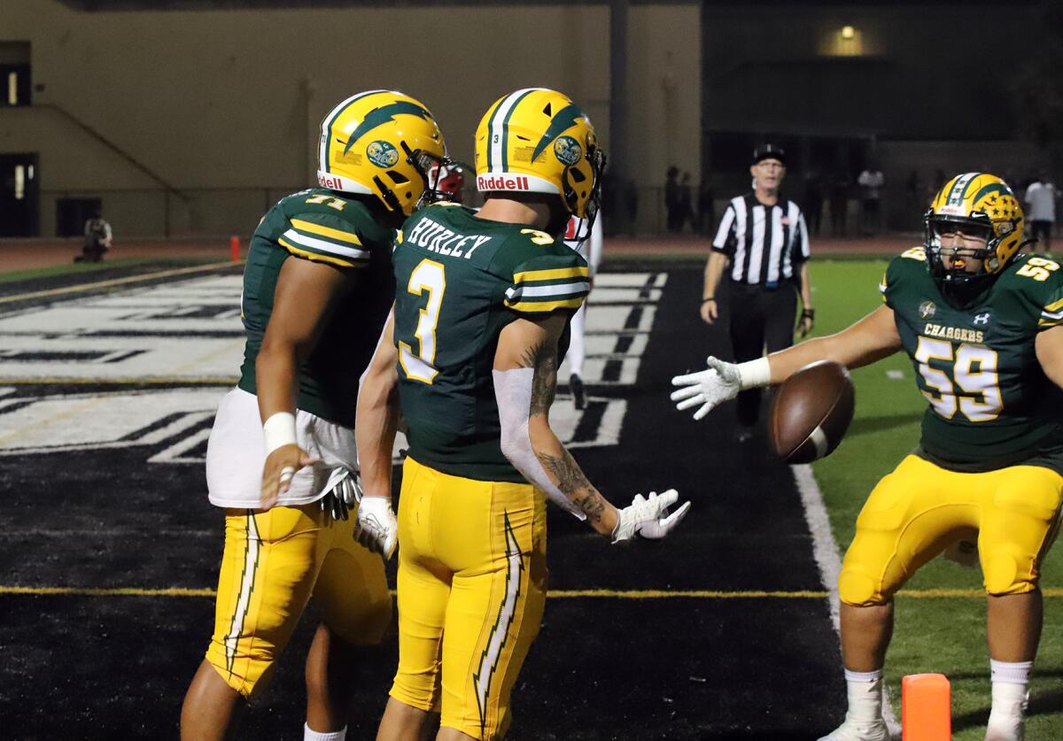Edison wide receiver Ashton Hurley (3) celebrates scoring a touchdown in the third quarter of Friday's victory.