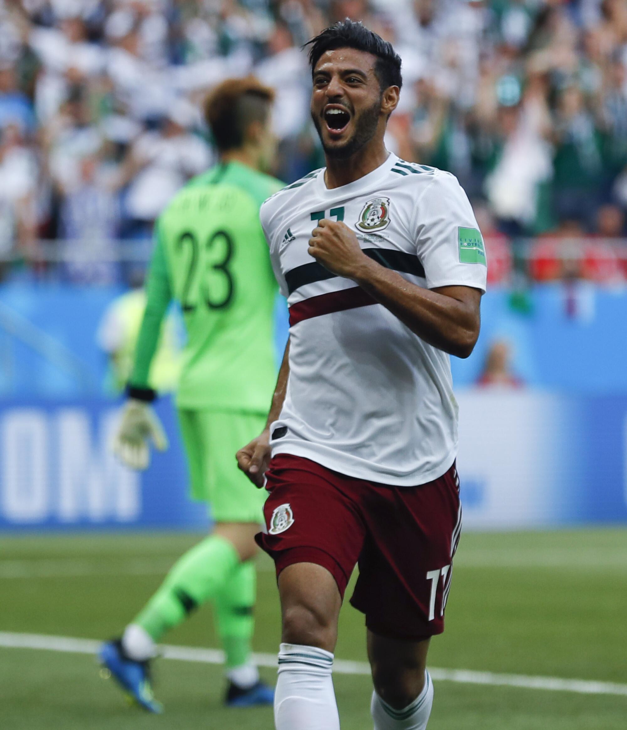 Mexico's Carlos Vela celebrates after scoring the  on-Don, Russia, Saturday, June 23, 2018. (AP Photo/Eduardo Verdugo)