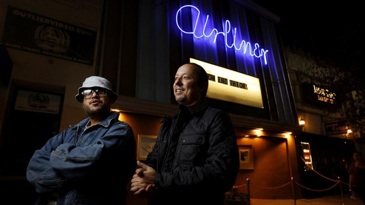 Low End Theory's Elvin "DJ Nobody" Estela, left, and Kevin Moo, at the weekly club night the Low End Theory at the Airliner. The club will conclude a 12-year run on Wednesday.