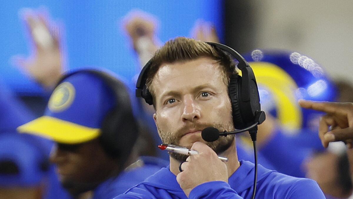 Rams head coach Sean McVay walks the sideline in thought against the Saints.