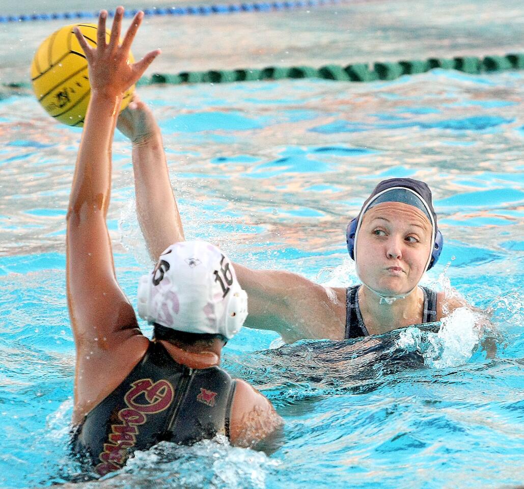 CV's Natalie Krebsbach makes a goal attempt past a Downey defender during a CIF Southern Section Division V first-round match at Burbank High on Wednesday, February 19, 2014.