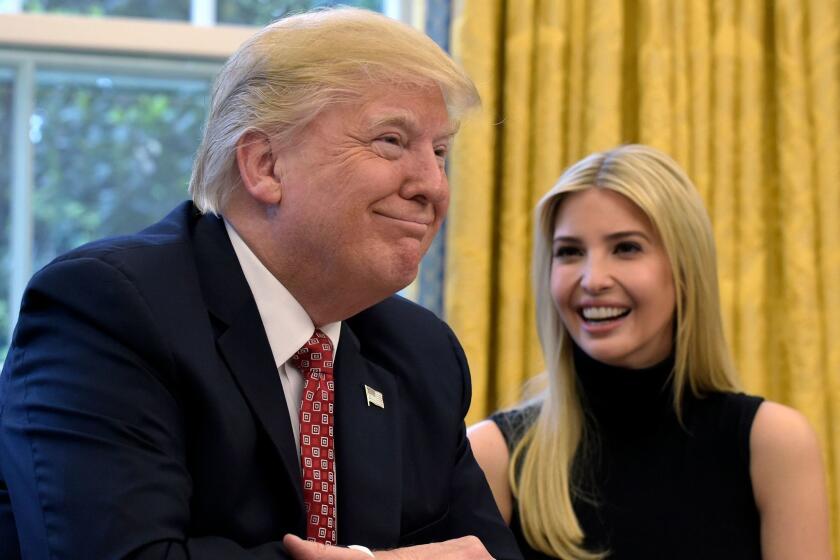 DAY 95 - In this April 24, 2017, file photo, President Donald Trump, accompanied by his daughter Ivanka Trump, talks via video conference with International Space Station Commander Peggy Whitson on the International Space Station from the Oval Office of the White House in Washington. (AP Photo/Susan Walsh, file)
